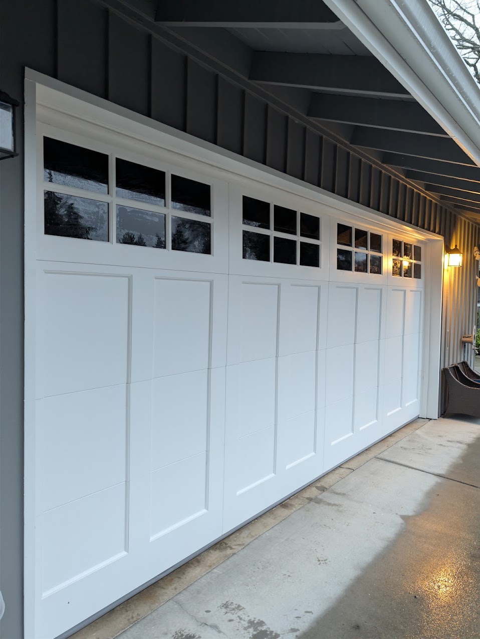 Carriage style garage door installation with windows by Northbridge Garage Door in Seattle, WA