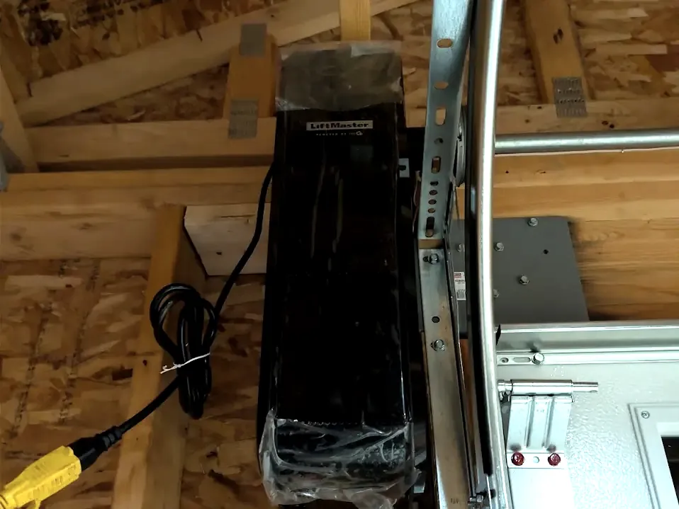 LiftMaster wall mount garage door opener mounted beside the torsion shaft in a Federal Way garage