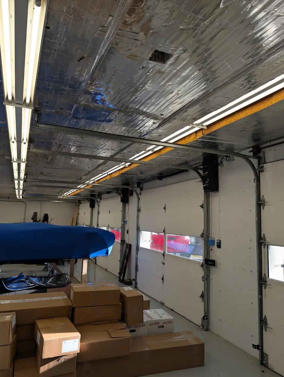 Wide view of a four bay Shoreline garage after the LiftMaster opener installation